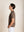 BERKN Signature T-shirt Walnut – zijkant, gedragen door Reno